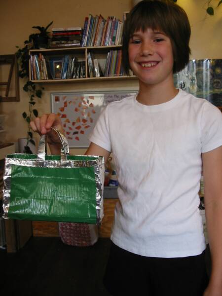 Alison displays her beautiful duct tape purse.